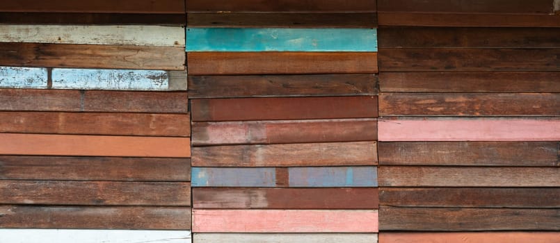 Colorful weathered wood plank wall texture background
