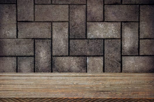 The background is blank wooden boards and a textured brick wall with lighting and vignetting. For product demonstrations, free space, layout, mockup, perspective board, background board.