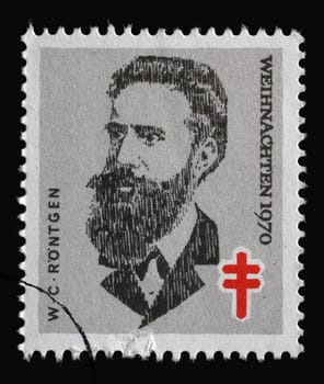 Stamp printed in Germany shows portrait of Wilhelm Conrad Röntgen, Christmas 1970, circa 1970