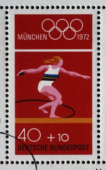 Stamp printed in Germany shows Discus women and Olympic Rings, Summer Olympic Games 1972 in Munich, circa 1972
