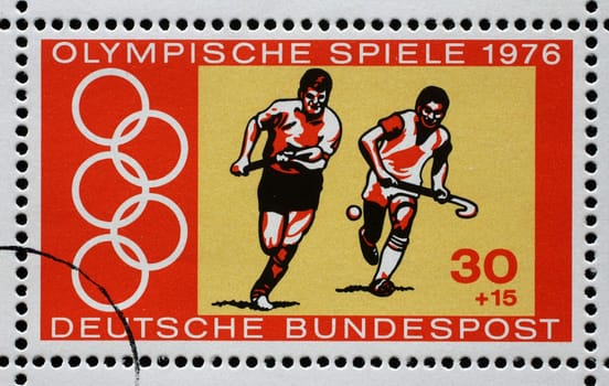 A stamp printed in Germany shows Hockey, Summer Olympic Games 1976 in Montreal, circa 1976