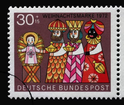 A stamp printed in Germany depicts the Three Wise Men and the Child, Christmas, circa 1972