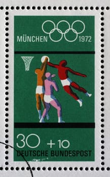 Stamp printed in Germany shows Basketball and Olympic Rings, Summer Olympic Games 1972 in Munich, circa 1972