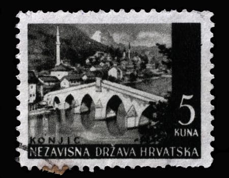 A stamp printed in Croatia shows Konjic bridge, Series Landscapes, circa 1941