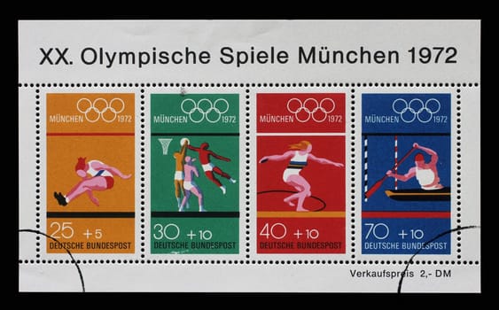 Stamp printed in Germany showing a block of letterheads at the 1972 Summer Olympics in Munich: Olympic rings with the sports motifs: long jump, basketball, discus throw, canoe slalom, circa 1972