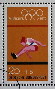 Stamp printed in Germany shows Long Jump and Olympic Rings, Summer Olympic Games 1972 in Munich, circa 1972