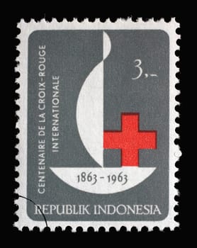 Stamp printed in Indonesia shows 100 years of the International Red Cross, series, circa 1963