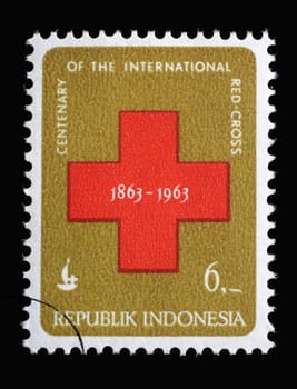 Stamp printed in Indonesia shows 100 years of the International Red Cross, series, circa 1963