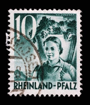 Stamp printed in Germany, Rheinland, that shows Girl Carrying Grapes, circa 1948