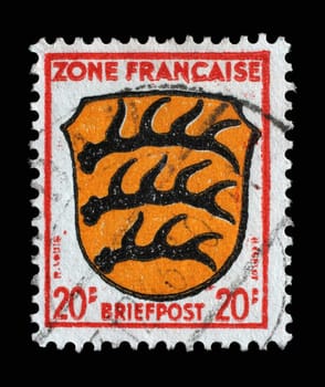 Stamp printed in Germany, the French zone showing the Coat of Arms of Wurttemberg, circa 1945