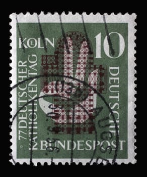Stamp printed in Germany, shows a hand raised to the oath in front of the floor plan of the Cologne Cathedral. occasion was the 77th German Catholic Day in Cologne, circa 1956