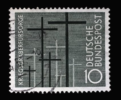Stamp printed in Germany, shows Cemetery Crosses, to commemorate people of Germany who died during WWII, circa 1956