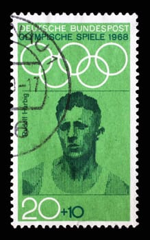 Stamp printed in Germany showing portrait of Rudolf Harbig, middle distance runner, 1968 Summer Olympics, the Games of the XIX Olympiad, Mexico City, circa 1968