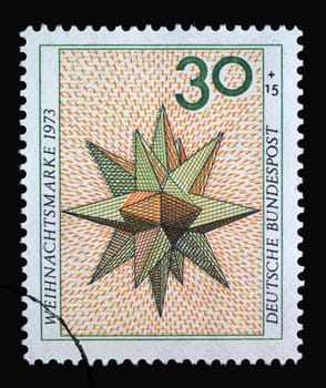 A stamp printed in Germany showing a three-dimensional star, Christmas stamp, circa 1973