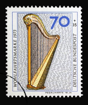 A stamp printed in Germany shows Pedal Harp, 18th Century, Musical Instrument, circa 1973