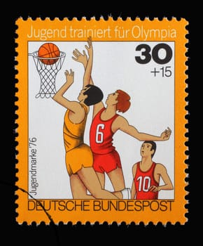 A stamp printed in Germany shows Basketball, Youth training for the Olympics, circa 1976