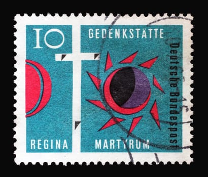 Stamp printed in Germany shows Cross of Golgotha, Darkened Sun and Moon, Consecration of Regina Martyrum Church in Berlin, circa 1963
