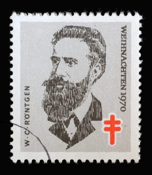 Stamp printed in Germany shows portrait of Wilhelm Conrad Röntgen, Christmas 1970, circa 1970