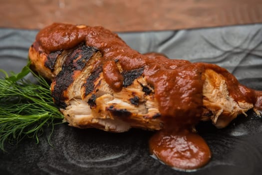 the cut chicken fillet baked in spices and tomato sauce,international kitchen