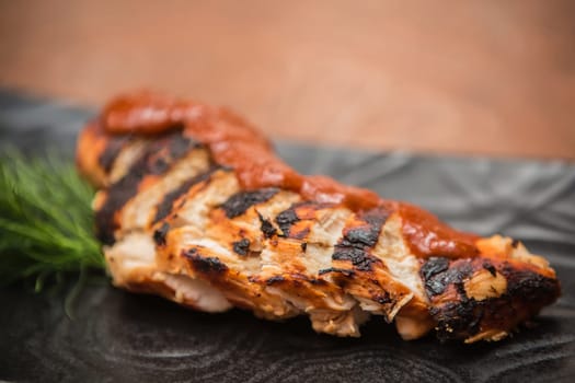 the cut chicken fillet baked in spices and tomato sauce,international kitchen