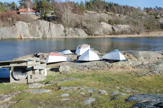a lot of small boats waiting to go to the sea
