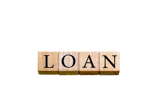 Word LOAN. Wooden small cubes with letters isolated on white background with copy space available. Concept image.