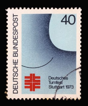 A stamp printed in Germany shows German Turner Gymnastic Festival in Stuttgart, Festival poster, circa 1973