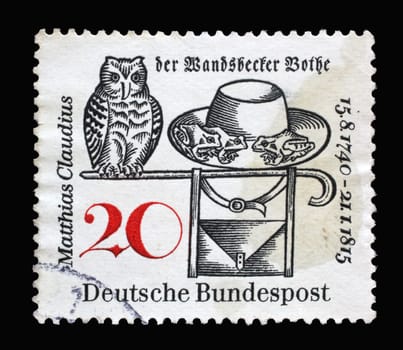 Stamp printed in Germany dedicated to Matthias Claudius (1740–1815), Poet and Editor of the Wandsbecker Bothe. Owl, Frogs, Hat and Satchel, circa 1965