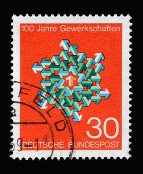 Stamp printed in Germany showing green and white arrows in different directions, Centenary of German Trade Unions, circa 1968