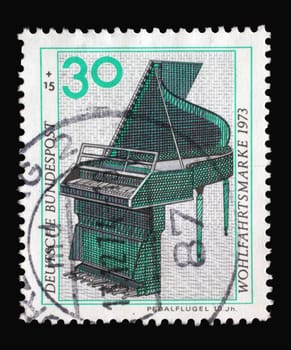 A stamp printed in Germany shows Pedal Piano, Musical Instrument, circa 1973