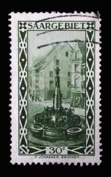 Stamp from Germany area Saar shows St. Johann Market fountain in Saarbrucken, circa 1927