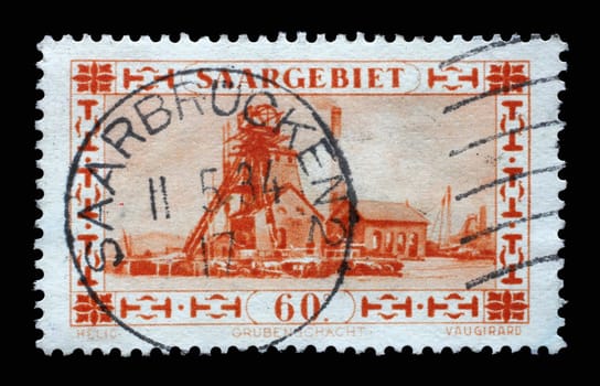 Stamp from Germany area Saar shows industrial landscape of the mining industry, circa 1930