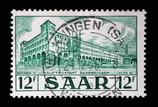 Stamp from Germany area Saar shows General Post Office in Saarbrucken, circa 1953