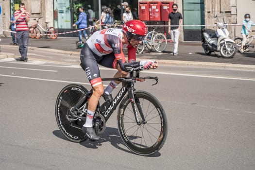 MILAN, ITALY - MAY 30: last stage of Giro 2021, Diego Ulissi competitor of UAE Emirates Team at high speed during individual time trial in city streets, shot on may 30, 2021 Milan, Italy.