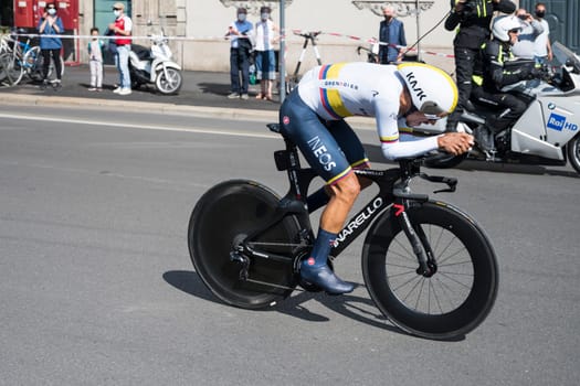 MILAN, ITALY - MAY 30: last stage of Giro 2021, Daniel Martinez competitor of Grenadier Team at high speed during individual time trial in city streets, shot on may 30, 2021 Milan, Italy.