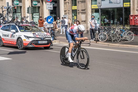 MILAN, ITALY - MAY 30: last stage of Giro 2021, Bauke Mollema competitor and TREK-Segafredo Team  following car at high speed during individual time trial in city streets, shot on may 30, 2021 Milan, Italy.