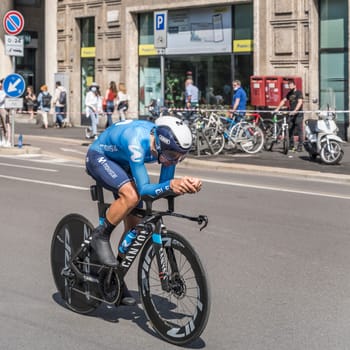 MILAN, ITALY - MAY 30: last stage of Giro 2021, Nelson Oliviera competitor of Moviestar Team  at high speed during individual time trial in city streets, shot on may 30, 2021 Milan, Italy.