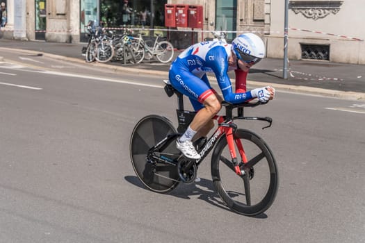 MILAN, ITALY - MAY 30: last stage of Giro 2021, Rudy Molard competitor of Groupama Team at high speed during individual time trial in city streets, shot on may 30, 2021 Milan, Italy.