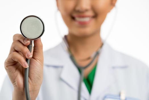 Close-up image of doctor with stethoscope in hands, selective focus