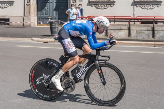 MILAN, ITALY - MAY 30: last stage of Giro 2021, Geoffrey Bouchard competitor of AG2R Citroen Team  at high speed during individual time trial in city streets, shot on may 30, 2021 Milan, Italy.