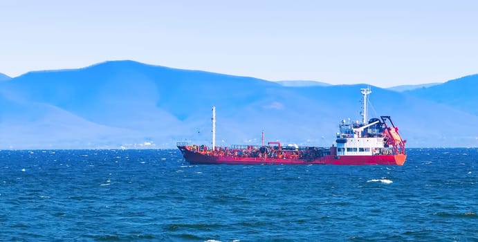 The selective focus bulk cargo ship to harbor quayside Vladivostok