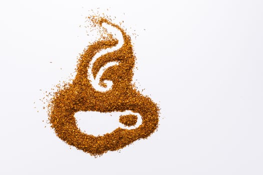 Rooibos tea in shape of tea cup on white background with copy space for your text