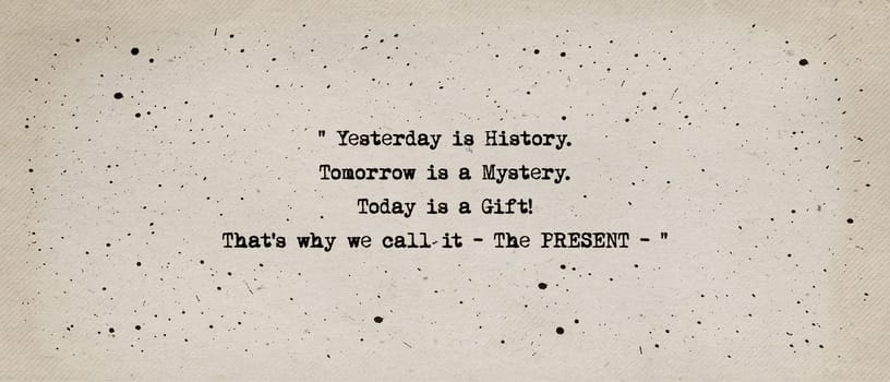 Yesterday is history, tomorrow is a mystery, today is a gift, that's why we call it the present. Beautiful and inspirational quote, typewriter font style over vintage paper background.
