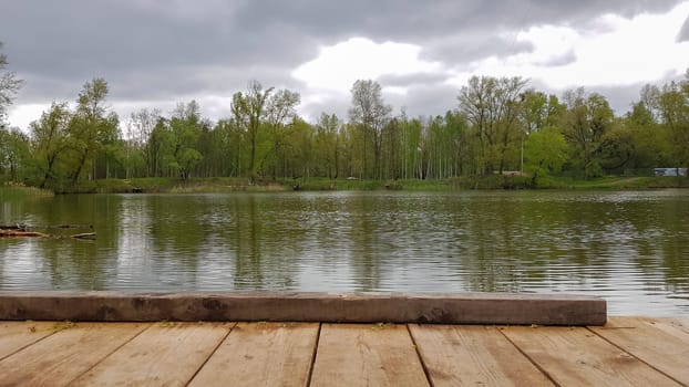 Reflection Natural Landscape View. Old wooden jetty, deck or pier in the lake. Nice looping background