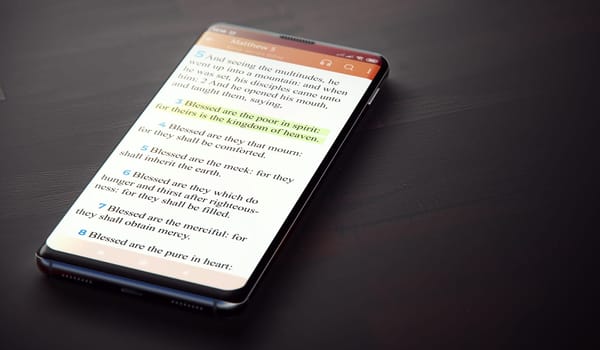 Bible On Smartphone. Matthew 5:3 Highlighted in NKJV Bible on Modern Phone Screen. 3D render.