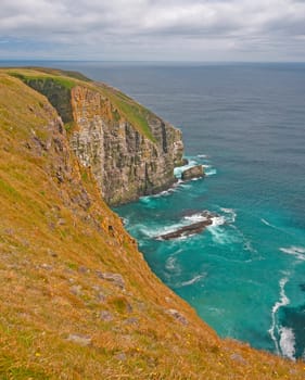 Steep Cliffs Leading to a Rocky Bay on Cape St Mary in Newfoundland, Canada