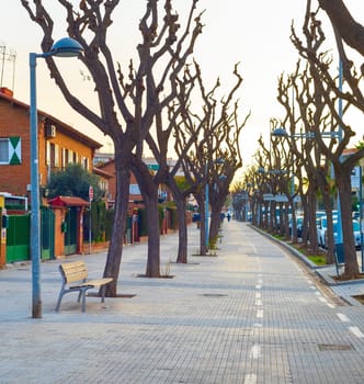 Empty alley  in the morning light. Barcelona, Spain