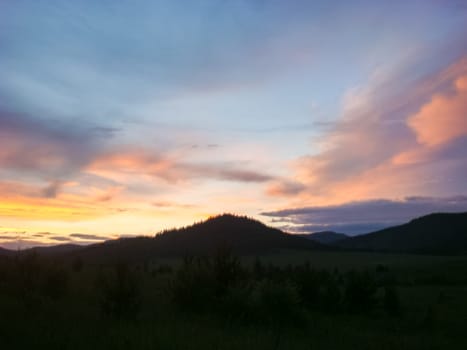 A beautiful sunset in the small bor tract. Khakassia, russia. Small Bor tract, Hakkasia. Forests and meadows Khakassia