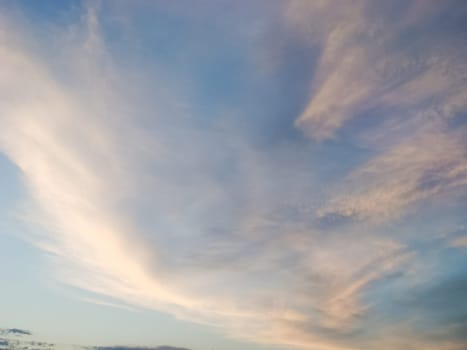 The sky with the clouds at sunset. The light of the sunset on the clouds. sky in the evening.