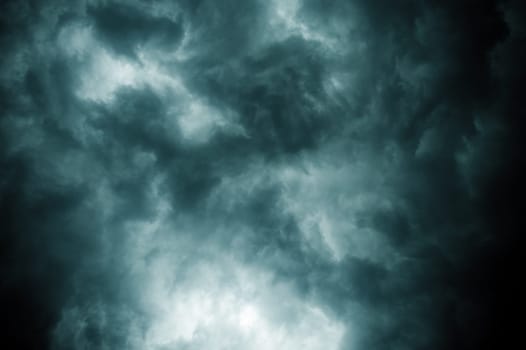 Thick dark black storm clouds covering summer sunset sky with gale-speed wind blowing just before Nor'westers Kalbaishakhi Bordoisila thunderstorm torrential rain. Atmospheric Texture background.